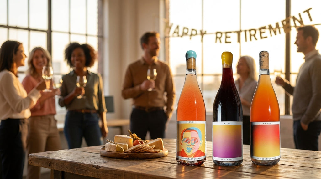Natural wine sampler bottles on a table at an office retirement celebration